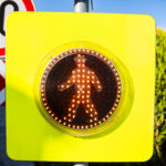 Road sign "Flashing pedestrian" with flashing lamp